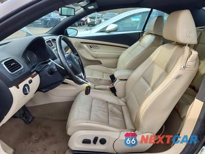 Zdjęcie 7 z 11 samochodu: 2012 VOLKSWAGEN EOS LUX VIN:WVWFW7AH7CV006875 - miniatura