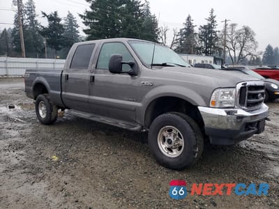Czwarte zdjęcie samochodu z boku: 2002 FORD F250 SUPER DUTY VIN:1FTNW21F02EC37080 - miniatura