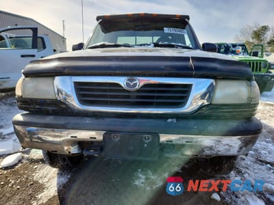 Piąte zdjęcie samochodu w środku: 1999 MAZDA B3000 CAB PLUS VIN:4F4ZR17V5XTM36878 - miniatura