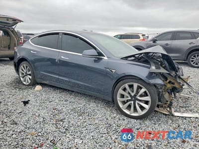Czwarte zdjęcie samochodu z boku: 2018 TESLA MODEL 3 VIN:5YJ3E1EA8JF047723 - miniatura
