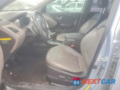 Zdjęcie 7 z 12 samochodu: 2011 HYUNDAI TUCSON GLS VIN:KM8JU3ACXBU297028 - miniatura