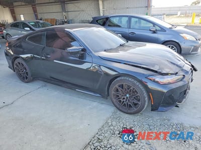 Czwarte zdjęcie samochodu z boku: 2022 BMW M4 COMPETITION VIN:WBS43AZ00NCK24417 - miniatura