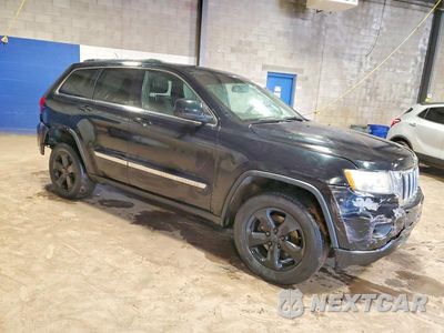 Czwarte zdjęcie samochodu z boku: 2012 JEEP GRAND CHEROKEE LAREDO VIN:1C4RJFAG1CC285202 - miniatura