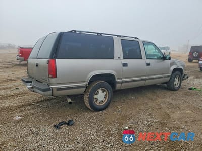 Trzecie zdjęcie samochodu z tyłu: 1999 CHEVROLET SUBURBAN C1500 VIN:3GNEC16R0XG196415 - miniatura