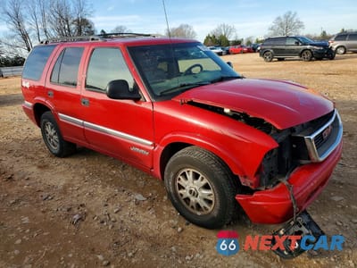 Czwarte zdjęcie samochodu z boku: 1998 GMC JIMMY VIN:1GKDT13W5W2540184 - miniatura