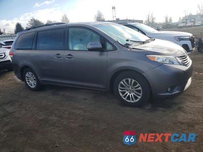 Czwarte zdjęcie samochodu z boku: 2011 TOYOTA SIENNA XLE VIN:5TDYK3DC8BS091571 - miniatura