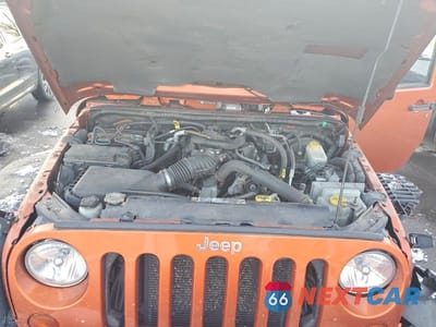 Zdjęcie 12 z 12 samochodu: 2011 JEEP WRANGLER UNLIMITED SAHARA VIN:1J4HA5H1XBL572649 - miniatura