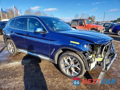 Czwarte zdjęcie samochodu z boku: 2022 BMW X3 XDRIVE30I VIN:5UX53DP07N9M98757 - miniatura