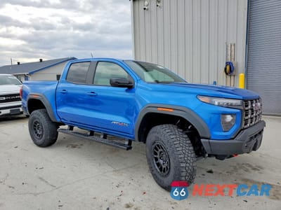 Czwarte zdjęcie samochodu z boku: 2024 GMC CANYON AT4X VIN:1GTP6EEK5R1230788 - miniatura