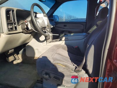 Zdjęcie 7 z 13 samochodu: 2002 CHEVROLET SUBURBAN C1500 VIN:1GNEC16Z62J250906 - miniatura