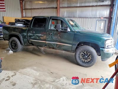 Czwarte zdjęcie samochodu z boku: 2006 GMC NEW SIERRA K1500 VIN:2GTEK13T061214267 - miniatura