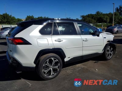 Trzecie zdjęcie samochodu z tyłu: 2024 TOYOTA RAV4 PRIME XSE VIN:JTMFB3FV1RD187490 - miniatura