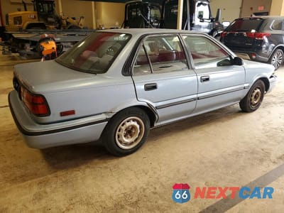 Trzecie zdjęcie samochodu z tyłu: 1992 TOYOTA COROLLA DLX VIN:2T1AE94A9NC193226 - miniatura