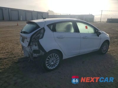 Trzecie zdjęcie samochodu z tyłu: 2015 FORD FIESTA TITANIUM VIN:3FADP4FJ5FM144658 - miniatura