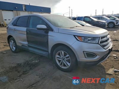 Czwarte zdjęcie samochodu z boku: 2015 FORD EDGE SEL VIN:2FMTK4J90FBC37991 - miniatura