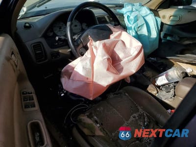 Zdjęcie 8 z 12 samochodu: 1997 NISS MAXIMA GLE VIN:JN1CA21D2VT201740 - miniatura