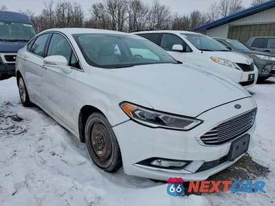 Czwarte zdjęcie samochodu z boku: 2017 FORD FUSION TITANIUM VIN:3FA6P0K91HR124071 - miniatura