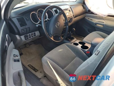 Zdjęcie 8 z 11 samochodu: 2010 TOYOTA TACOMA ACCESS CAB VIN:5TEUU4EN9AZ674456 - miniatura