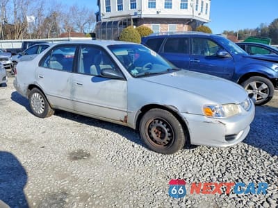 Czwarte zdjęcie samochodu z boku: 2001 TOYOTA COROLLA CE VIN:1NXBR12E31Z433234 - miniatura