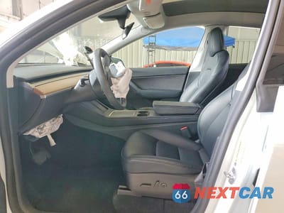 Zdjęcie 7 z 13 samochodu: 2022 TESLA MODEL Y VIN:7SAYGDEE8NF504530 - miniatura