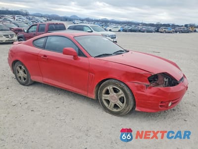 Czwarte zdjęcie samochodu z boku: 2003 HYUNDAI TIBURON GT VIN:KMHHN65F93U092142 - miniatura