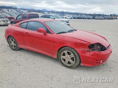 Czwarte zdjęcie samochodu z boku: 2003 HYUNDAI TIBURON GT VIN:KMHHN65F93U092142 - miniatura