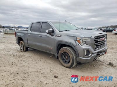 Czwarte zdjęcie samochodu z boku: 2019 GMC SIERRA K1500 AT4 VIN:3GTP9EEDXKG283423 - miniatura