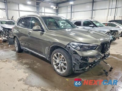 Czwarte zdjęcie samochodu z boku: 2022 BMW X5 XDRIVE40I VIN:5UXCR6C04N9M69305 - miniatura