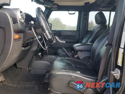 Zdjęcie 7 z 14 samochodu: 2014 JEEP WRANGLER UNLIMITED RUBICON VIN:1C4HJWFG0EL160778 - miniatura