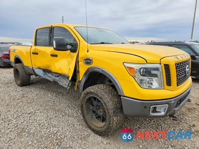 Czwarte zdjęcie samochodu z boku: 2016 NISSAN TITAN XD SL VIN:1N6BA1F47GN509342 - miniatura