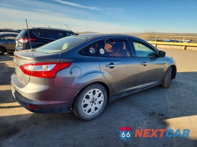 Trzecie zdjęcie samochodu z tyłu: 2012 FORD FOCUS VIN:1FAHP3F23CL470170 - miniatura