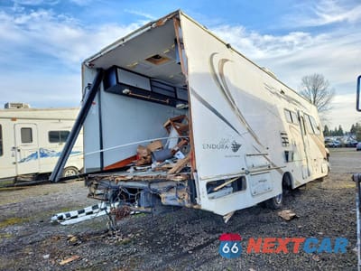 Czwarte zdjęcie samochodu z boku: 2005 CHEVROLET C5500 RECREATIONAL VEHICLE VIN:1GBE5U1E35F506861 - miniatura
