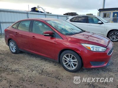 Czwarte zdjęcie samochodu z boku: 2017 FORD FOCUS SE VIN:1FADP3F26HL296259 - miniatura