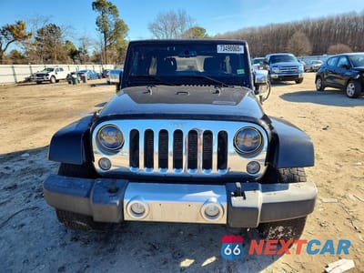 Piąte zdjęcie samochodu w środku: 2015 JEEP WRANGLER UNLIMITED SAHARA VIN:1C4BJWEG3FL689912 - miniatura