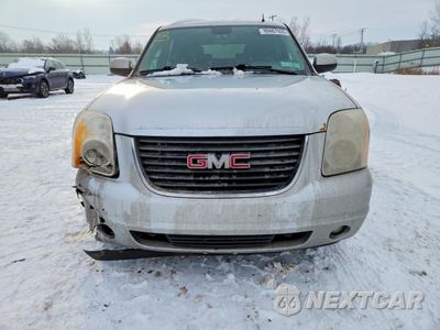 Piąte zdjęcie samochodu w środku: 2011 GMC YUKON SLE VIN:1GKS2AE0XBR261480 - miniatura
