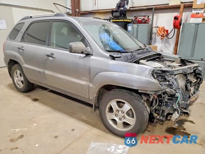 Czwarte zdjęcie samochodu z boku: 2006 KIA SPORTAGE LX VIN:KNDJE723467197440 - miniatura