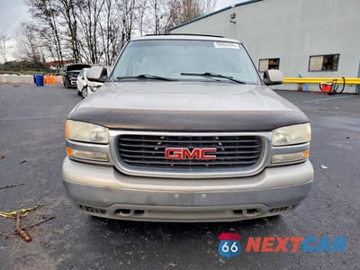 Piąte zdjęcie samochodu w środku: 2000 GMC YUKON XL K1500 VIN:3GKFK16T1YG139965 - miniatura