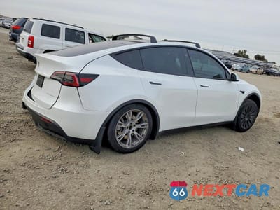 Trzecie zdjęcie samochodu z tyłu: 2023 TESLA MODEL Y VIN:7SAYGAEE1PF881184 - miniatura