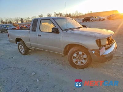 Czwarte zdjęcie samochodu z boku: 2000 NISSAN FRONTIER KING CAB XE VIN:1N6DD26S6YC350590 - miniatura