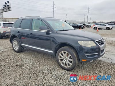 Czwarte zdjęcie samochodu z boku: 2009 VOLKSWAGEN TOUAREG 2 V6 VIN:WVGBE77LX9D001208 - miniatura