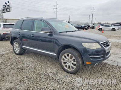 Czwarte zdjęcie samochodu z boku: 2009 VOLKSWAGEN TOUAREG 2 V6 VIN:WVGBE77LX9D001208 - miniatura