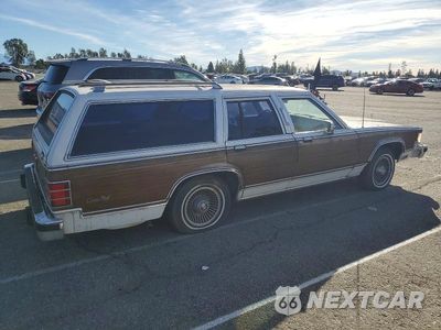 Trzecie zdjęcie samochodu z tyłu: 1985 MERCURY MARQUIS COLONY PARK VIN:2MEBP94F2FX626360 - miniatura