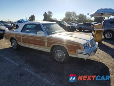 Czwarte zdjęcie samochodu z boku: 1985 CHRYSLER LEBARON VIN:1C3BC55E1FG278895 - miniatura