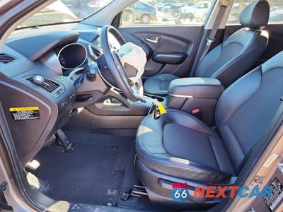 Zdjęcie 7 z 12 samochodu: 2013 HYUNDAI TUCSON GLS VIN:KM8JU3AC3DU726321 - miniatura