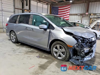 Czwarte zdjęcie samochodu z boku: 2019 HONDA ODYSSEY EXL VIN:5FNRL6H70KB128987 - miniatura