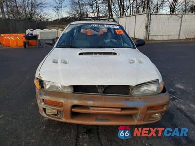 Piąte zdjęcie samochodu w środku: 1997 SUBARU IMPREZA OUTBACK VIN:JF1GF4859VH819270 - miniatura