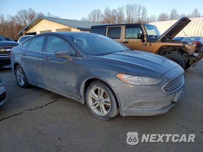 Czwarte zdjęcie samochodu z boku: 2018 FORD FUSION S HYBRID VIN:3FA6P0UU8JR142185 - miniatura