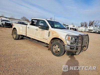 Czwarte zdjęcie samochodu z boku: 2022 FORD F350 SUPER DUTY VIN:1FT8W3DT4NEC11347 - miniatura
