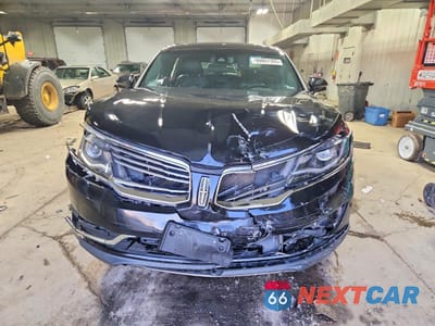 Piąte zdjęcie samochodu w środku: 2016 LINCOLN MKX RESERVE VIN:2LMTJ8LR3GBL27715 - miniatura