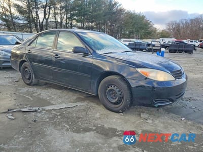 Czwarte zdjęcie samochodu z boku: 2002 TOYOTA CAMRY LE VIN:4T1BE32K02U060409 - miniatura